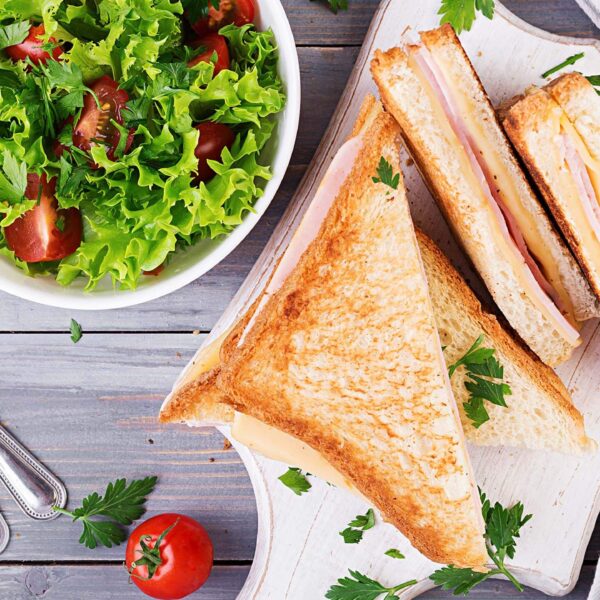 Sandwich with ham cheese and salad